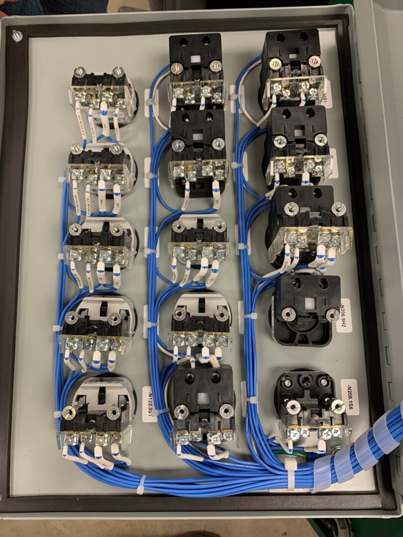 A bunch of wires that are connected to some electrical equipment.